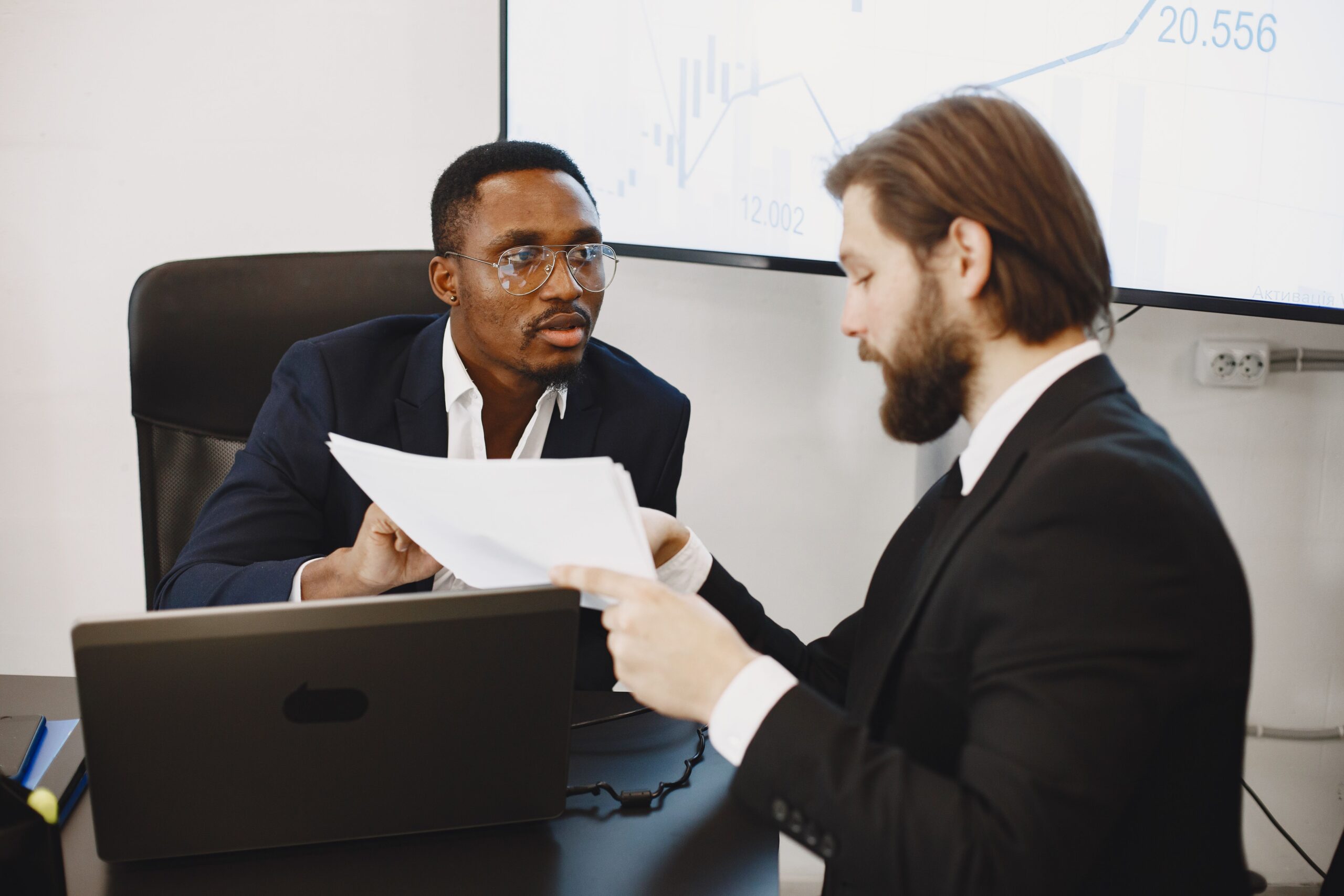 pexels-gustavo-fring-6285072 Business owners discussing running two businesses under one limited company